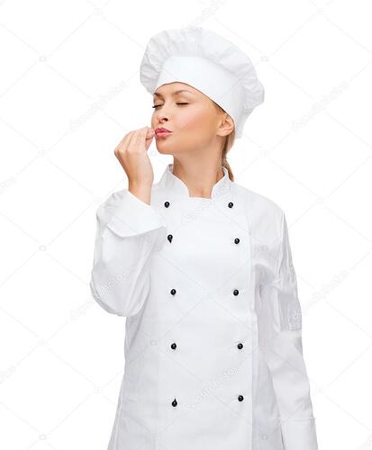 depositphotos_39275631-stock-photo-smiling-female-chef-showing-delicious