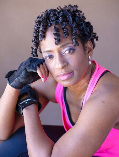 stock-photo-pink-strength-female-person-woman-fighter-survivor-black-woman-b7db5a28-5233-40df-aa3f-33b2885098a0