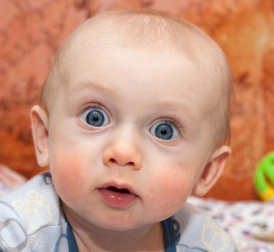 depositphotos_10808840-stock-photo-curious-baby-making-surprised-face