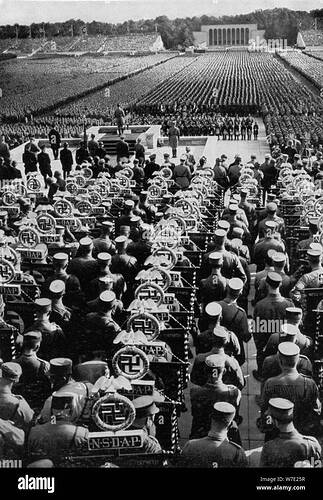 adolf-hitler-speaking-at-the-nuremberg-rally-germany-1935-artist-unknown-W7E25R