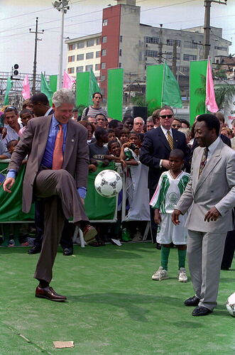President_William_J.Clinton_Kicking_a_Soccer_Ball-NARA-_81122856