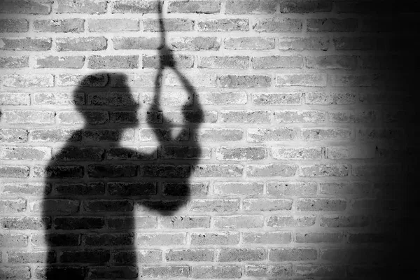 depositphotos_263991394-stock-photo-shadow-of-sad-man-hanging